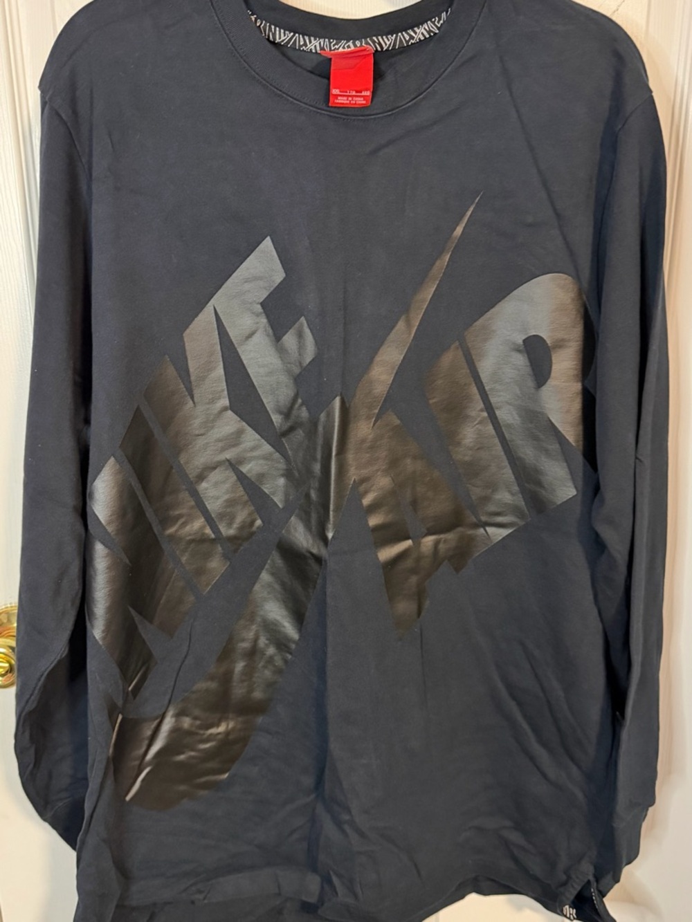 Nike Black Tee with Red Tag and White Logo